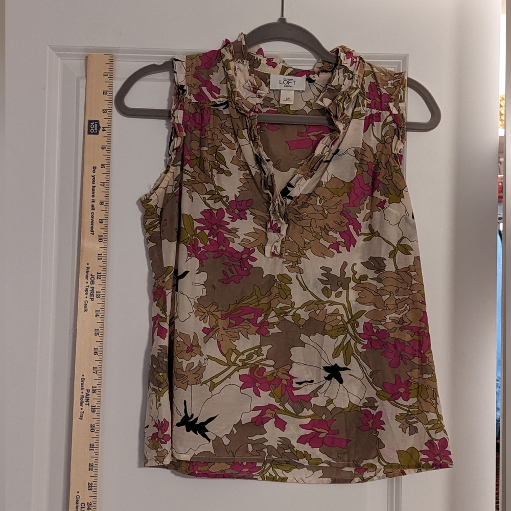 Beautiful sleeveless popover blouse